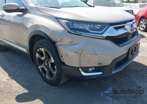 2019 Honda Cr-V Touring z USA, uszkodzony, nr VIN 5J6RW2H92KL014529